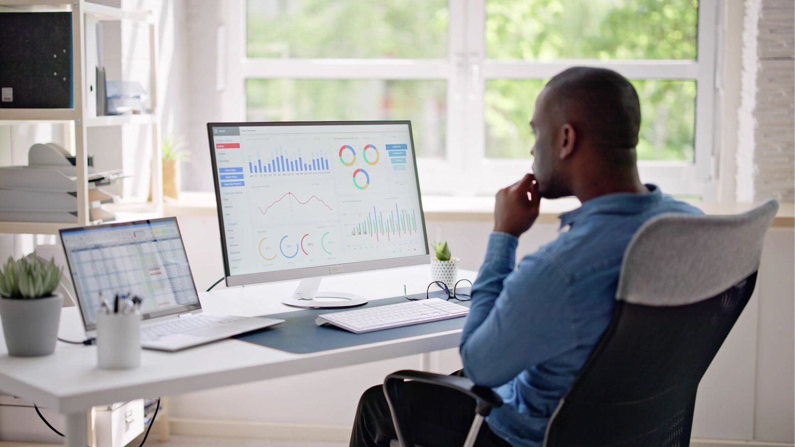 Man looking on computer screen